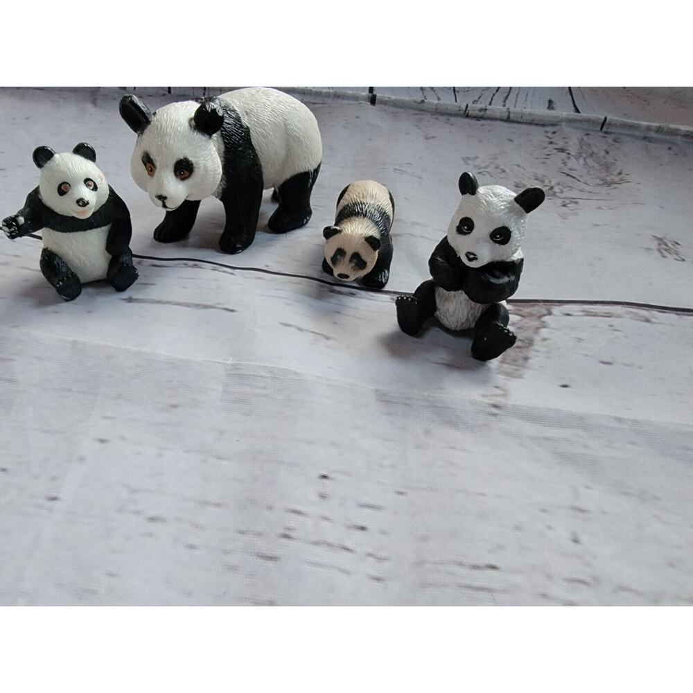 lot of 4 panda bear mom and cubs figures